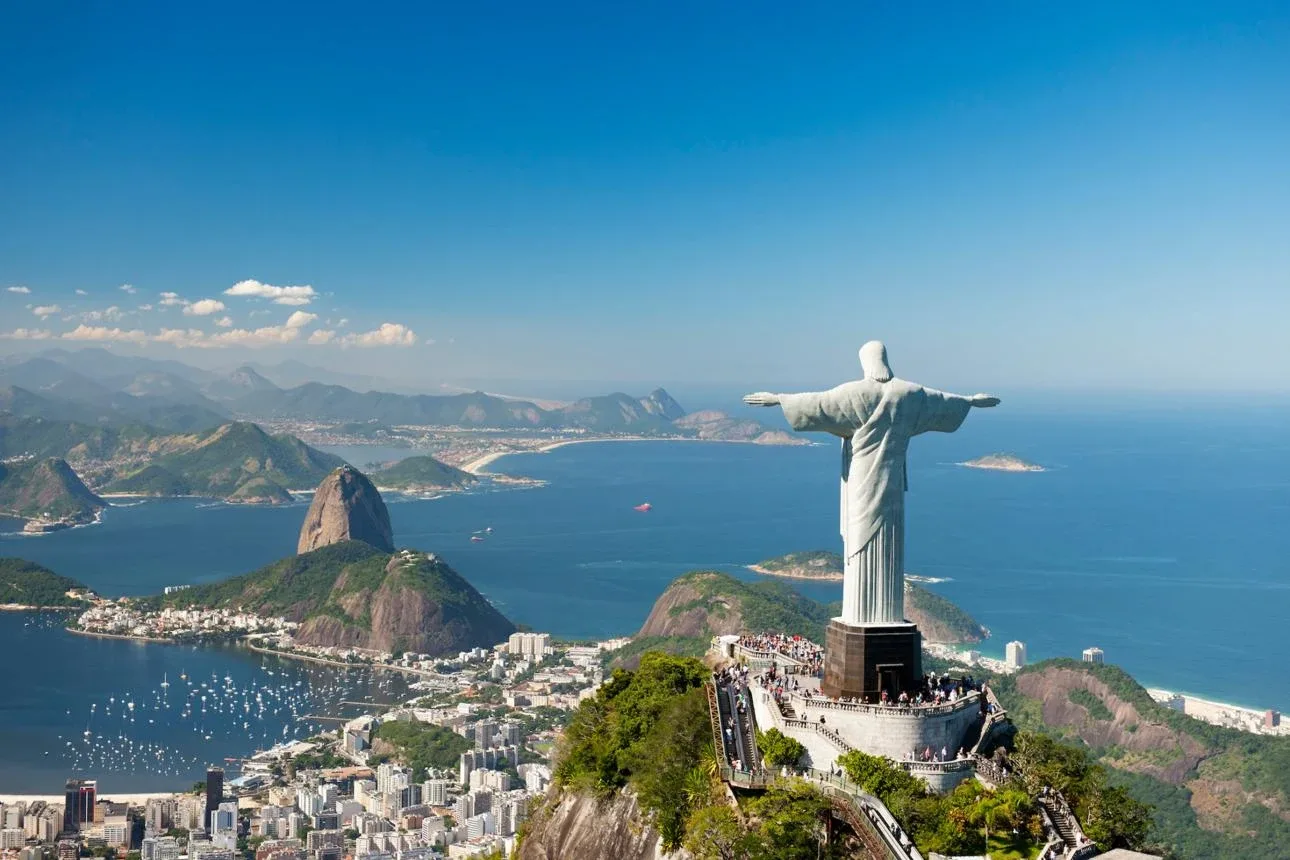 Christ the Redeemer above Rio de Janeiro, with Sugarloaf Mountain, Guanabara Bay and the city below